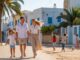 Traumhafter Auswandererurlaub nach Djerba, Familie genießt sonnigen Strand und Ferienatmosphäre, idyllisches Inselparadies, Djerba Auswandern, Trauminsel Marokko, mediterranes Klima, familienfreundliche Ferienwohnungen und Strände.